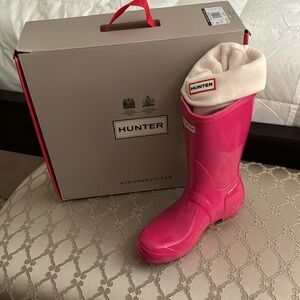 Hunter boots, pink with socks purchased separately.